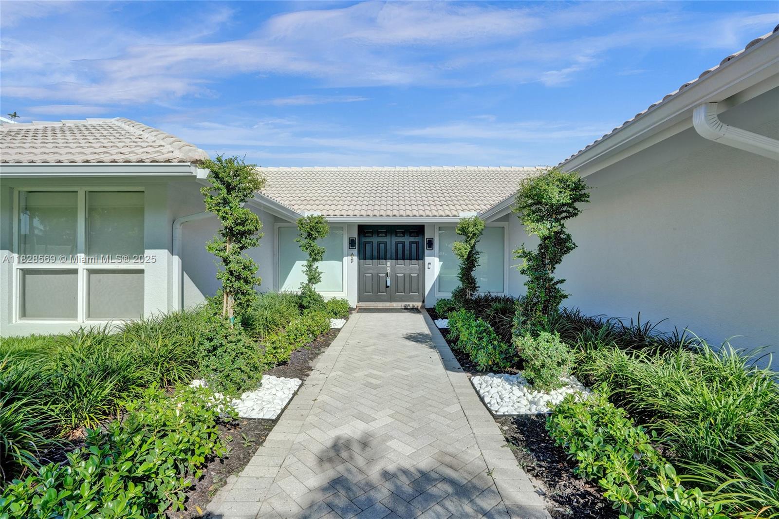 5854 Pinebrook Drive Boca Raton, FL 33433 - Photo 60 of 76 front view of a house with potted plants