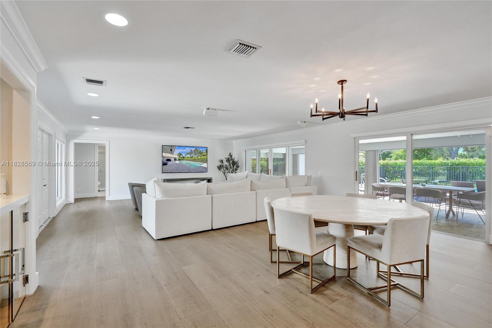 5854 Pinebrook Drive Boca Raton, FL 33433 - Photo 6 of 76 a view of a dining room with furniture window and outside view