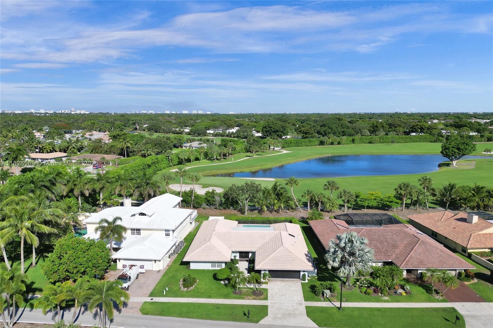 5854 Pinebrook Drive Boca Raton, FL 33433 - Photo 70 of 76 an aerial view of residential houses with outdoor space and street view