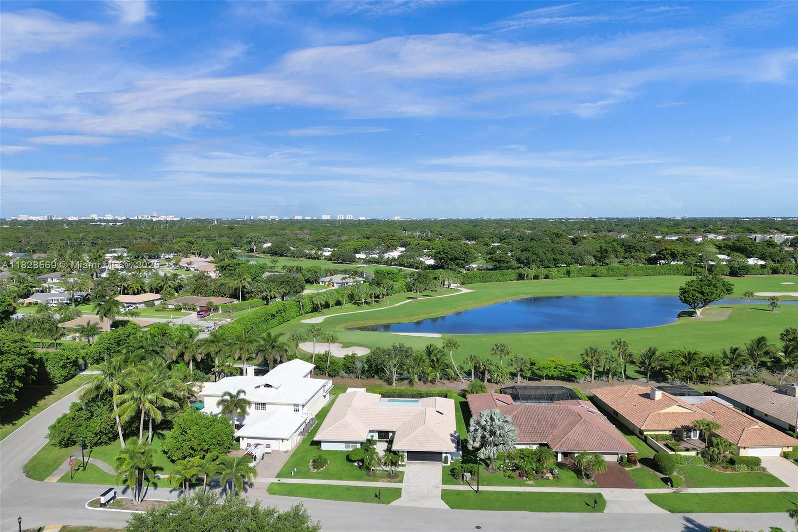 5854 Pinebrook Drive Boca Raton, FL 33433 - Photo 72 of 76 an aerial view of residential houses with outdoor space and trees