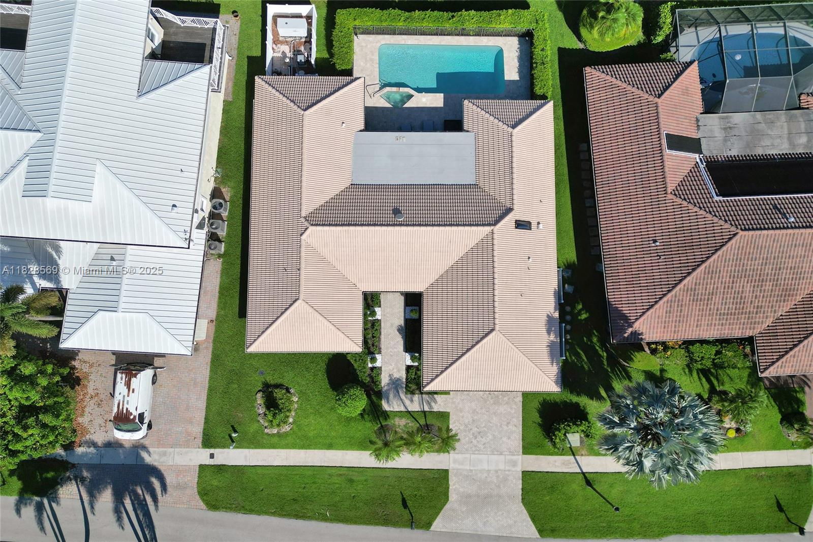 5854 Pinebrook Drive Boca Raton, FL 33433 - Photo 74 of 76 an aerial view of a house with yard and patio