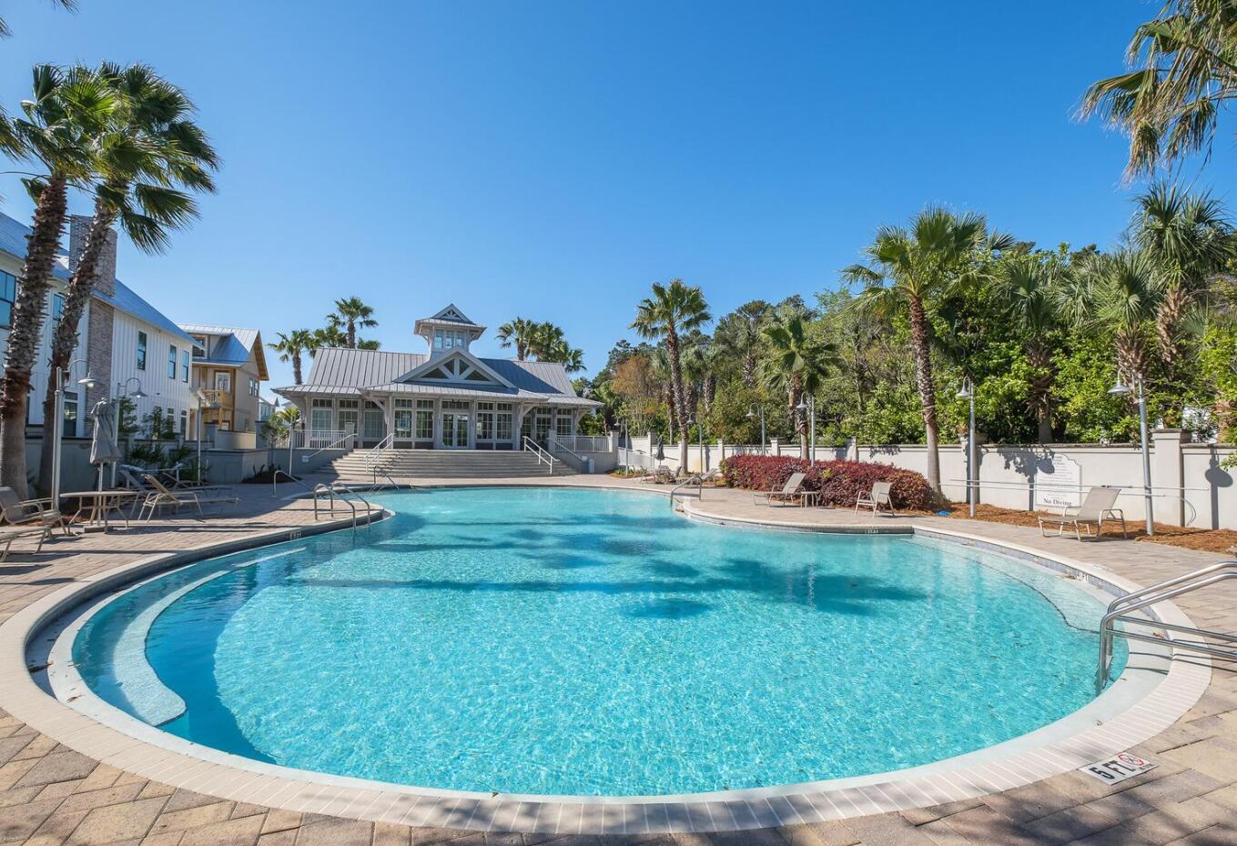 119 Grande Pointe Cir Inlet Beach Inlet Beach, FL 32461 - Photo 14 of 17 a swimming pool with outdoor seating and yard