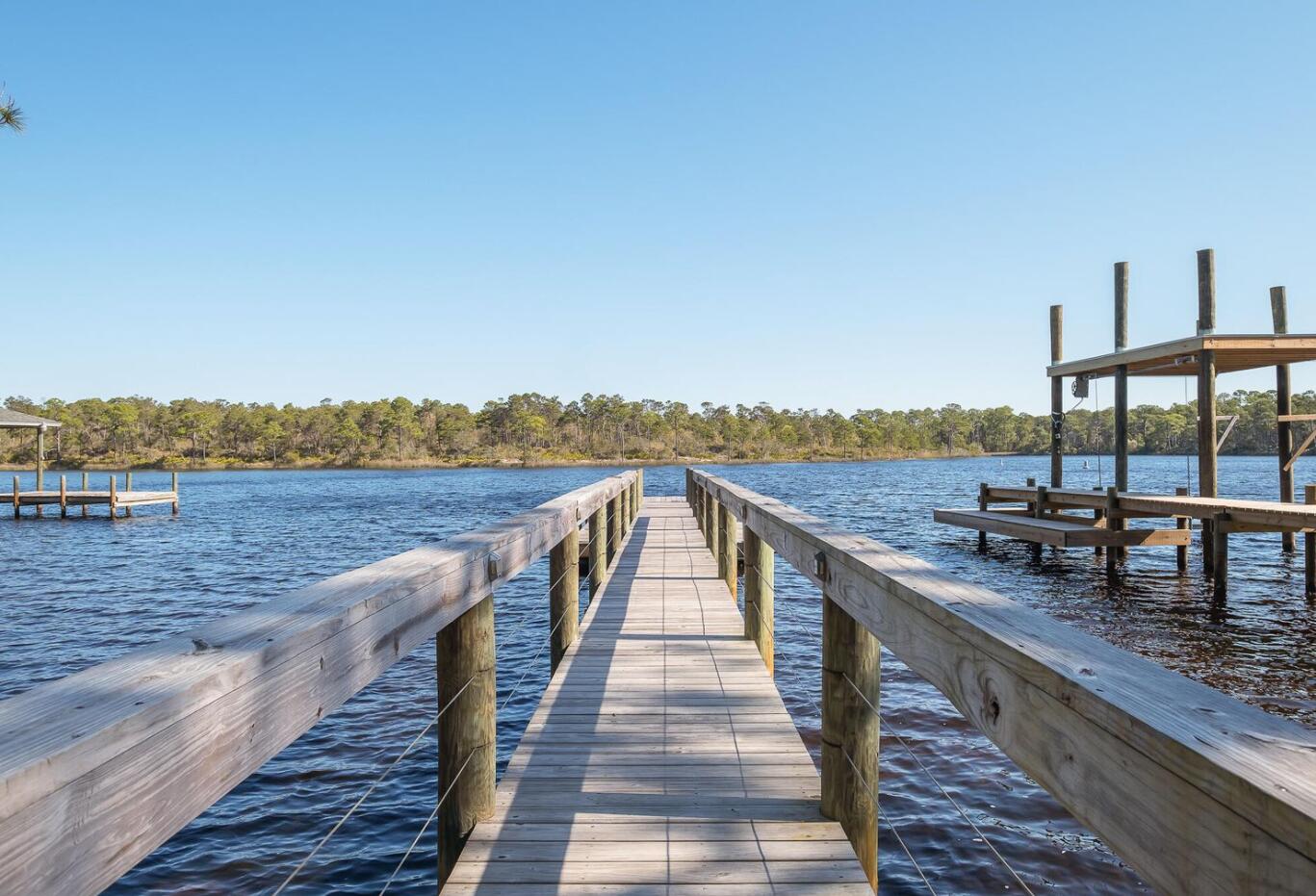 119 Grande Pointe Cir Inlet Beach Inlet Beach, FL 32461 - Photo 17 of 17 a view of wooden deck and lake with city view