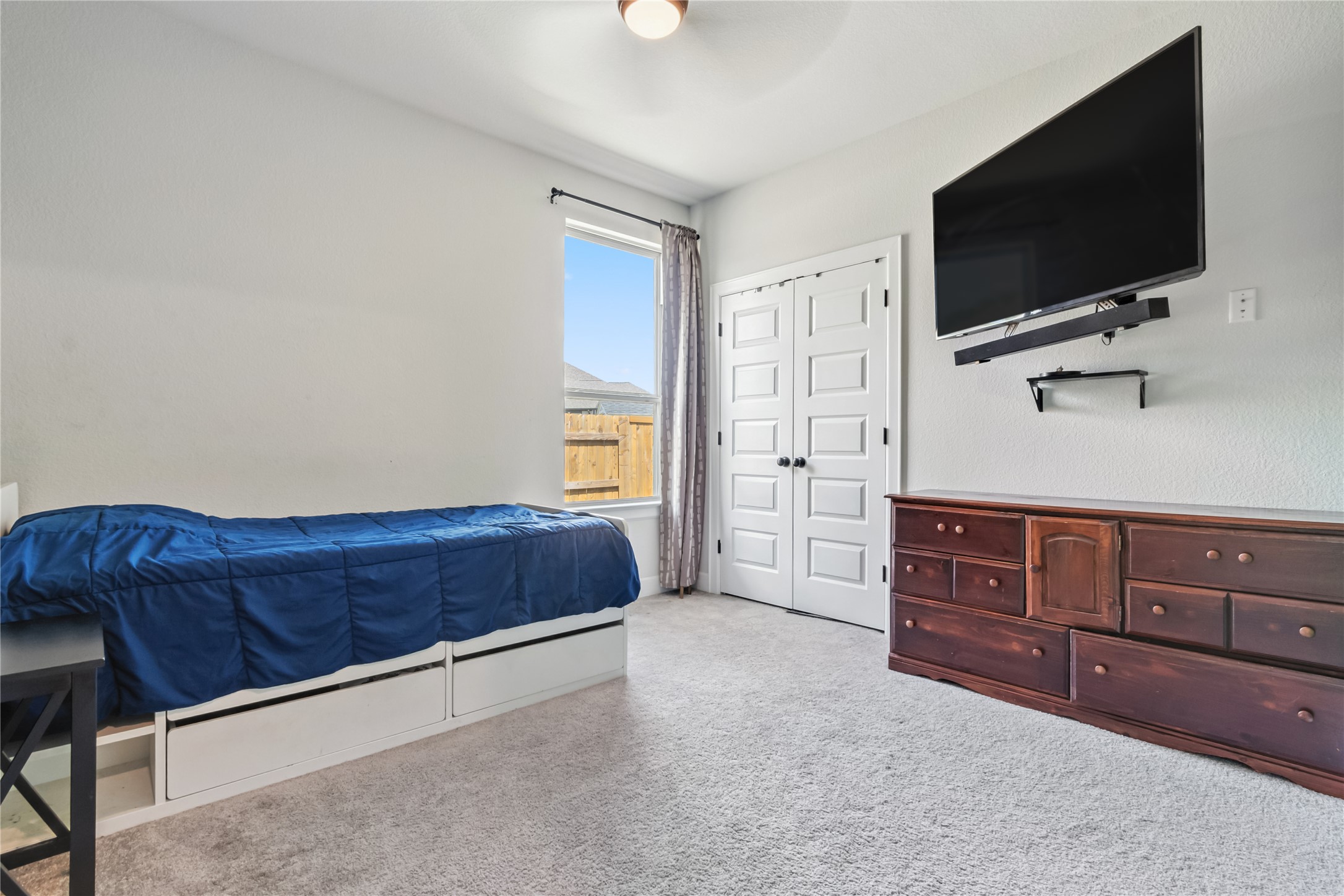 788 Cold Riv Run Kyle, TX 78640 - Photo 11 of 18 a living room with furniture and a flat screen tv