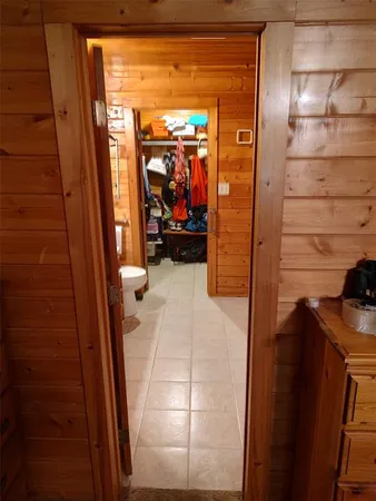 a close up of a utility room with washer and dryer