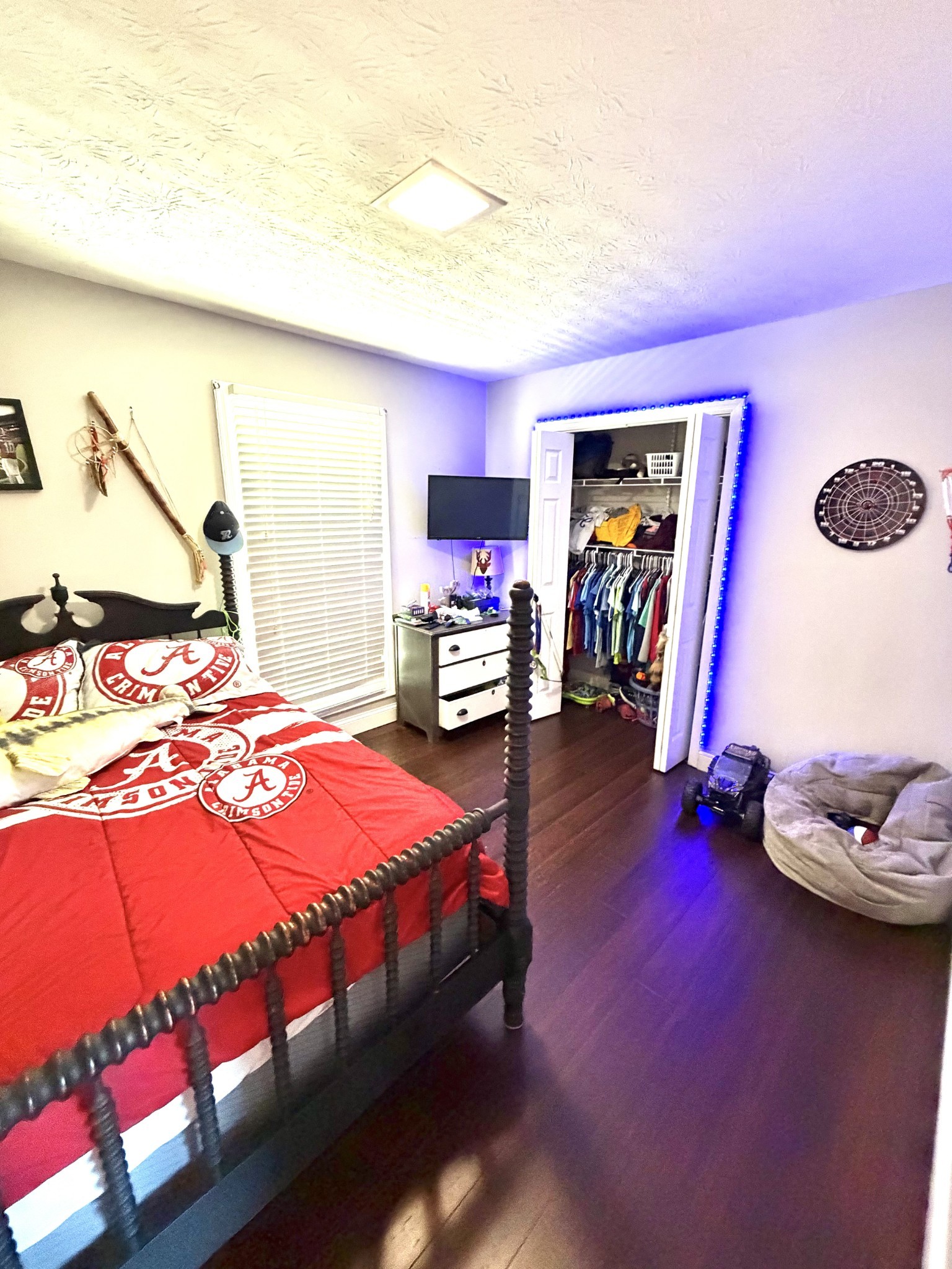 356 Lee Road Cottontown, TN 37048 - Photo 20 of 52 a bedroom with a bed and gym equipment