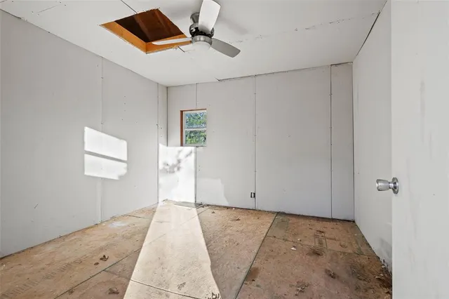 a view of a hallway with a white walls