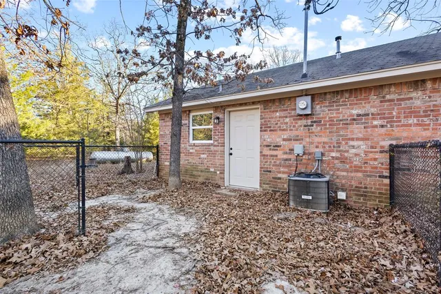 a backyard of a house with seating space