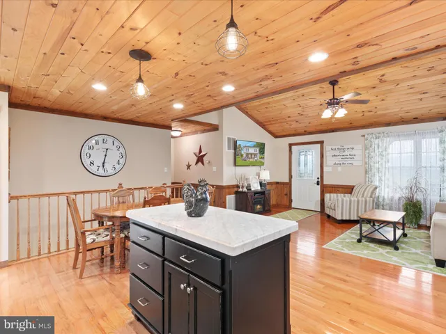a view of a kitchen with a sink and a stove