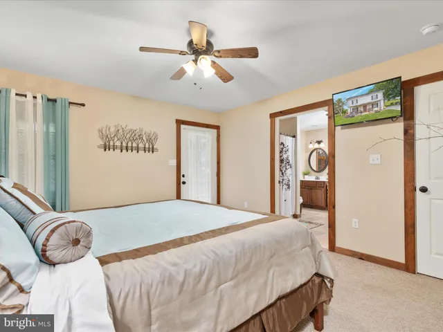 a kitchen with a refrigerator and a stove