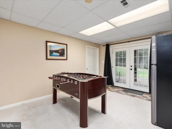 a view of a two chairs in the balcony