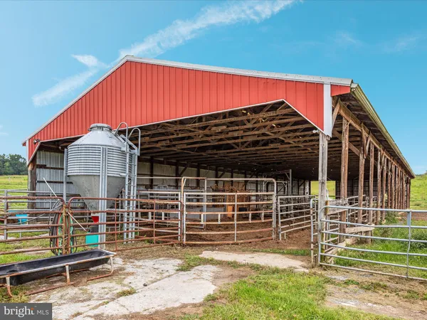 a kitchen with stainless steel appliances granite countertop a stove and a refrigerator