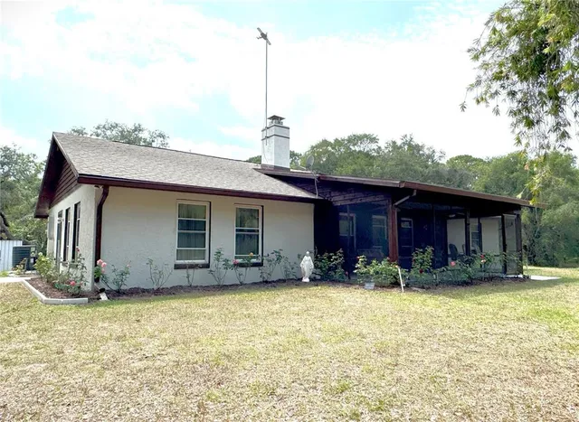 a house view with a garden space