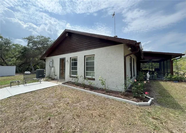 a kitchen with a refrigerator sink and microwave