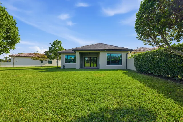 a view of a house with a garden