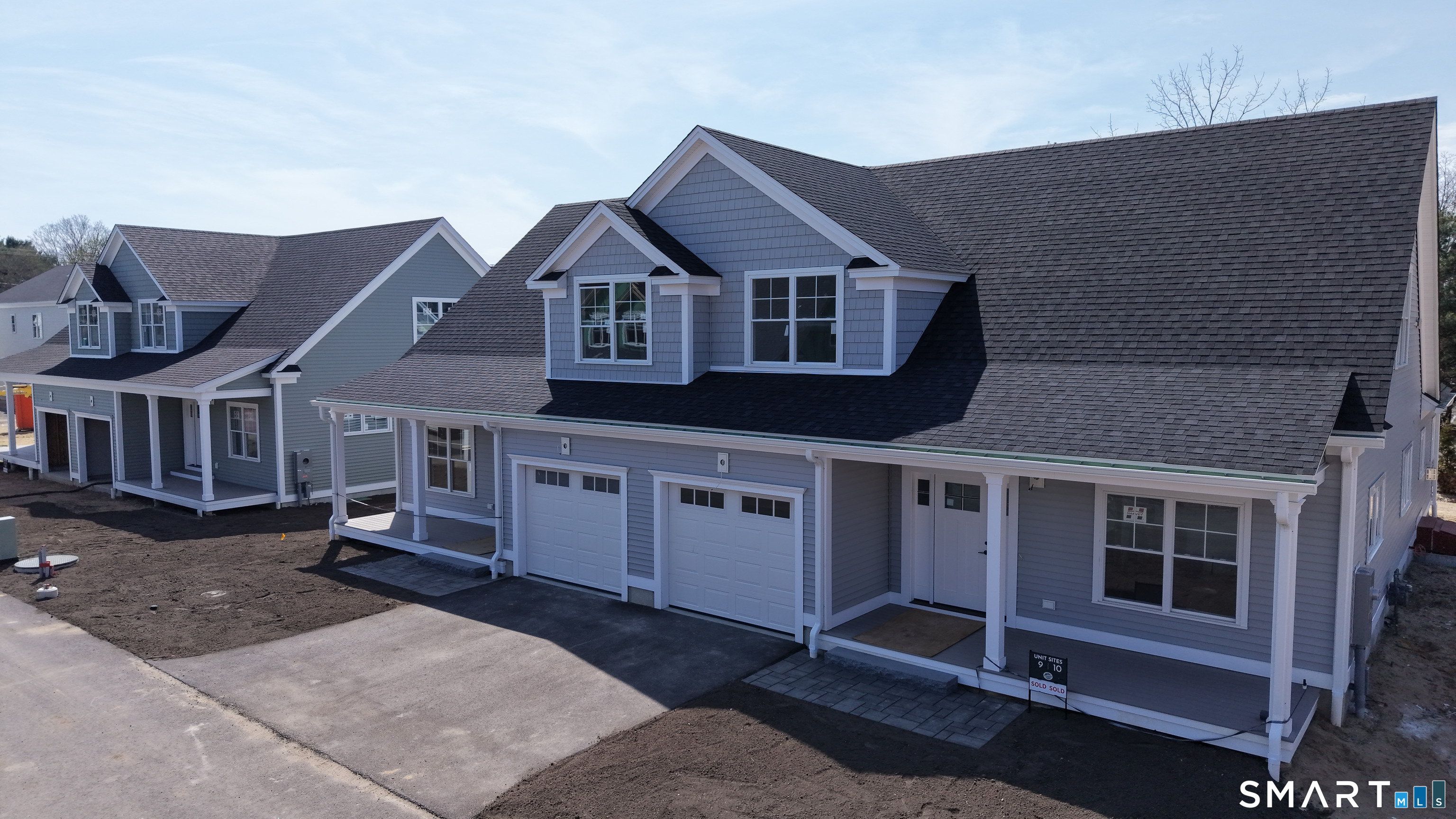 151-153 East Main Street, Unit 24 Clinton, CT 06413 - Photo 22 of 33 a view of a house with a balcony