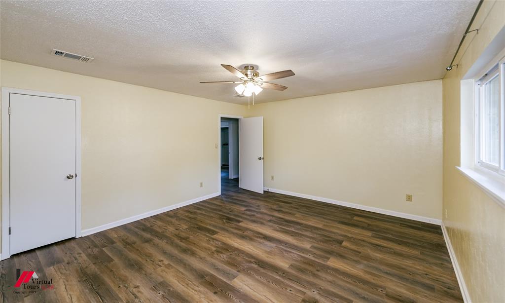 4236 Highway 527 Haughton, LA 71037 - Photo 14 of 38 a view of a room with a ceiling fan and a window