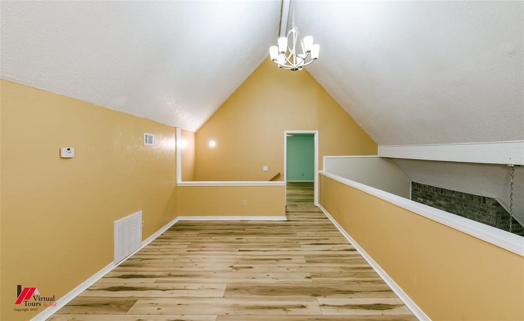 4236 Highway 527 Haughton, LA 71037 - Photo 22 of 38 a view of a room with wooden floor and staircase