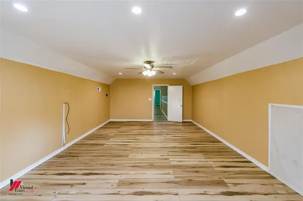 a view of a room with a staircase