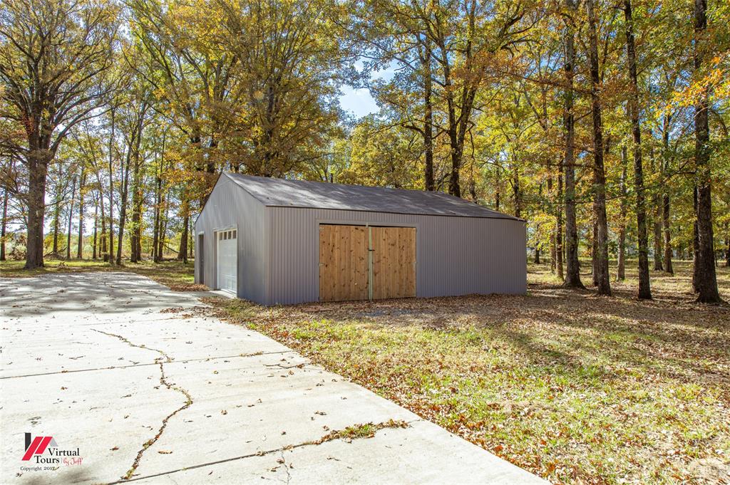 4236 Highway 527 Haughton, LA 71037 - Photo 37 of 38 a view of backyard of house