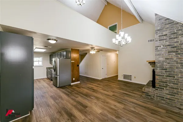 a view of a livingroom with a staircase