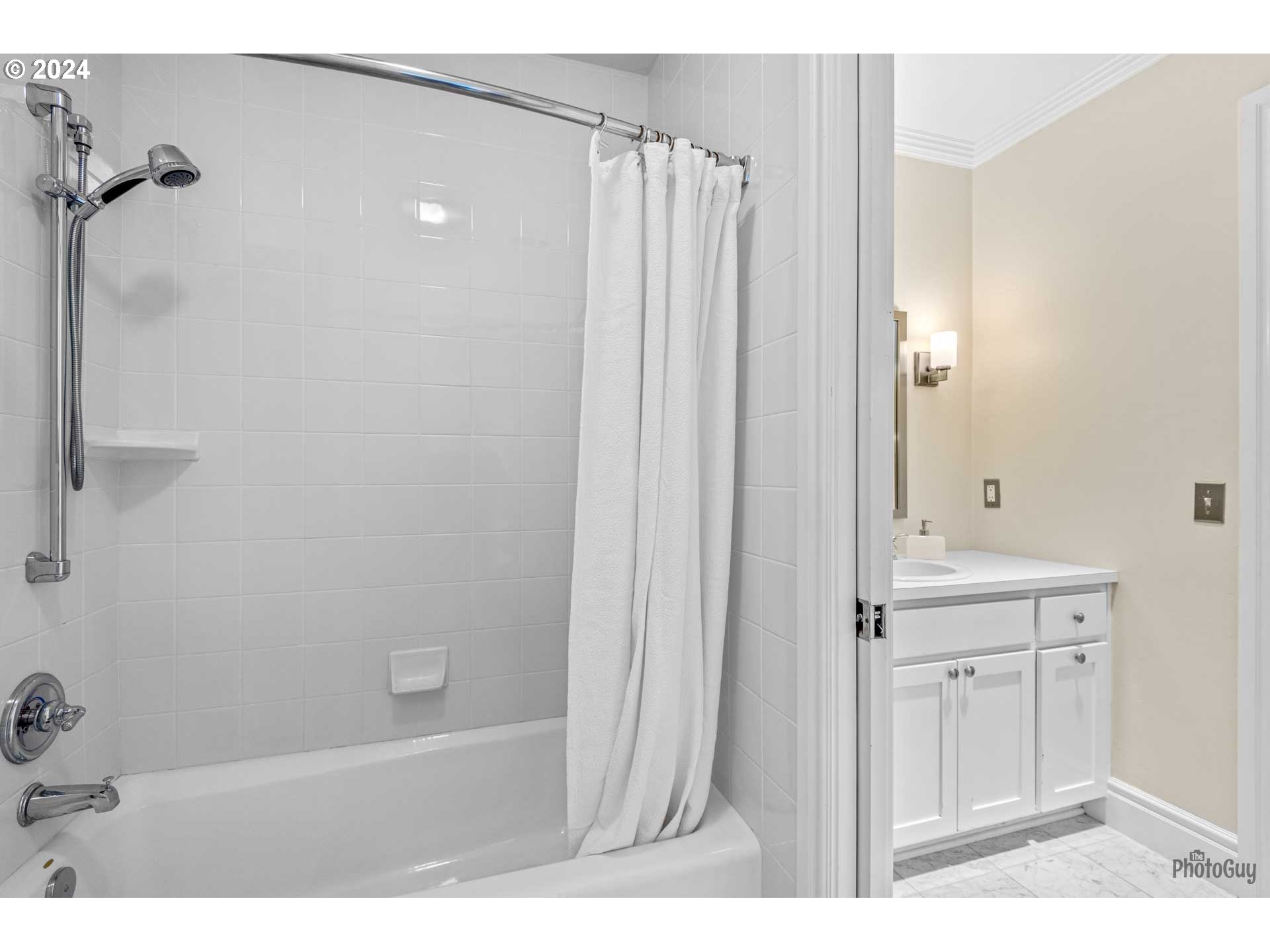2788 Riverwalk Loop Eugene, OR 97401 - Photo 39 of 48 a bathroom with a sink and a shower