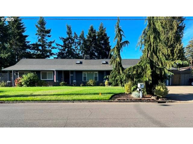 888 Wilson Street Woodburn, OR 97071 - Photo 1 of 1 a black and white photo of a house