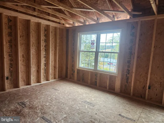 a view of a room with a window