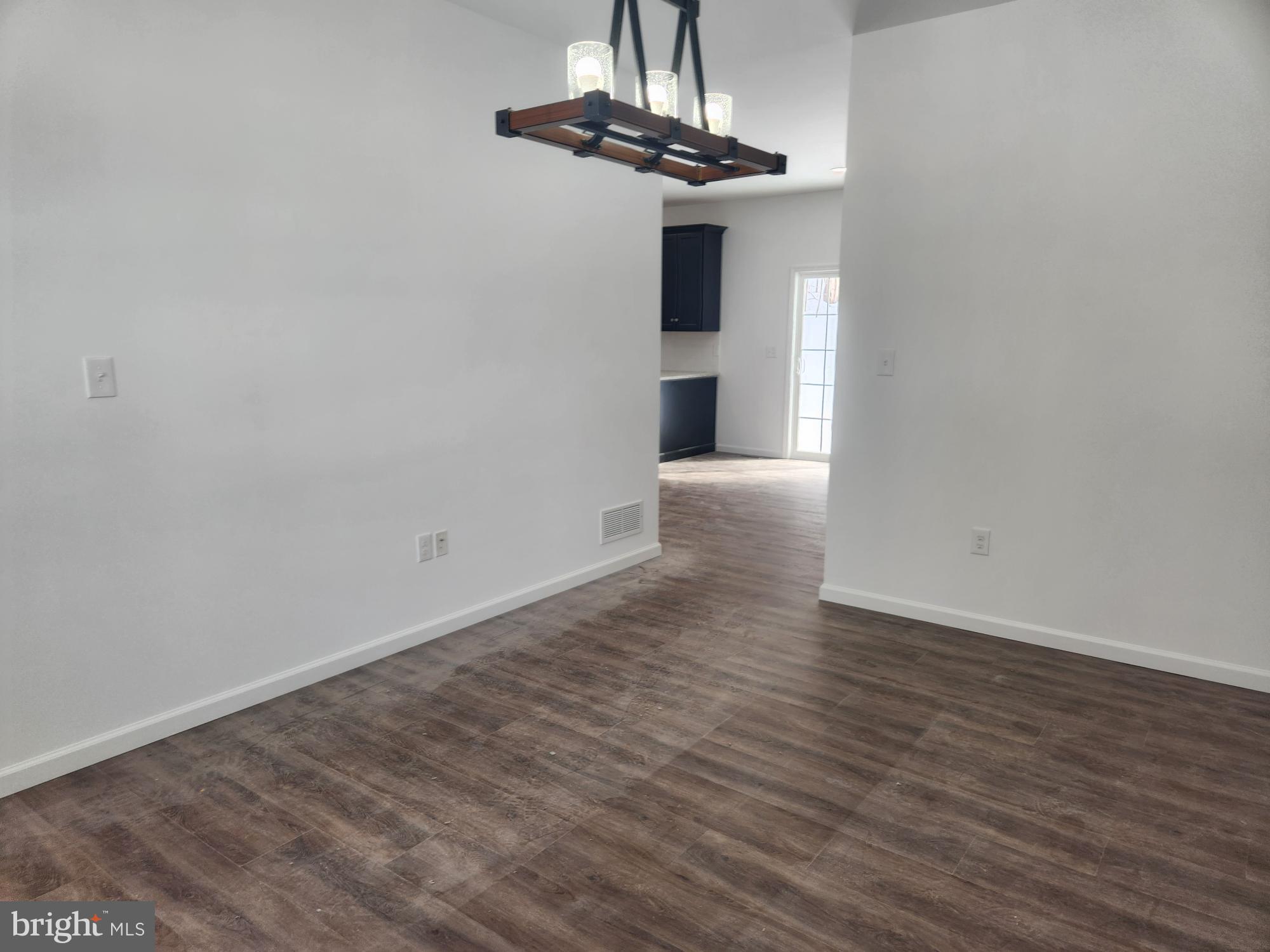 1929 Dunkleberger Road Elliottsburg, PA 17024 - Photo 12 of 48 a view of an empty room with a chandelier fan