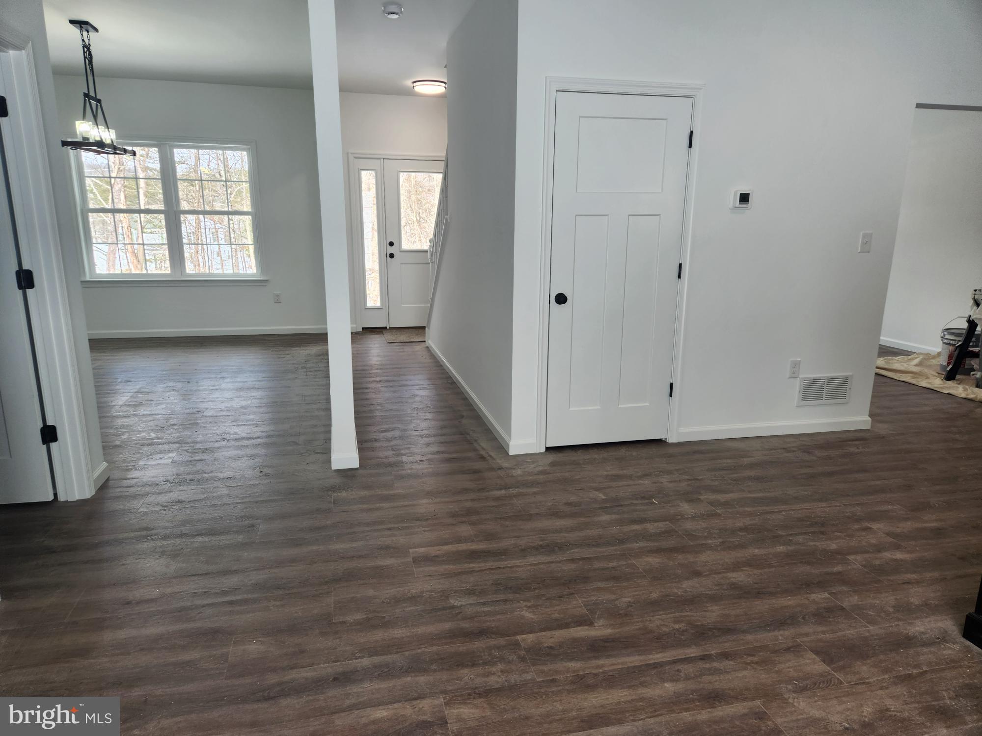1929 Dunkleberger Road Elliottsburg, PA 17024 - Photo 16 of 48 a view of an empty room with wooden floor and a window