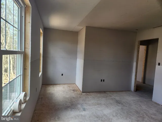 a view of a room with an empty room