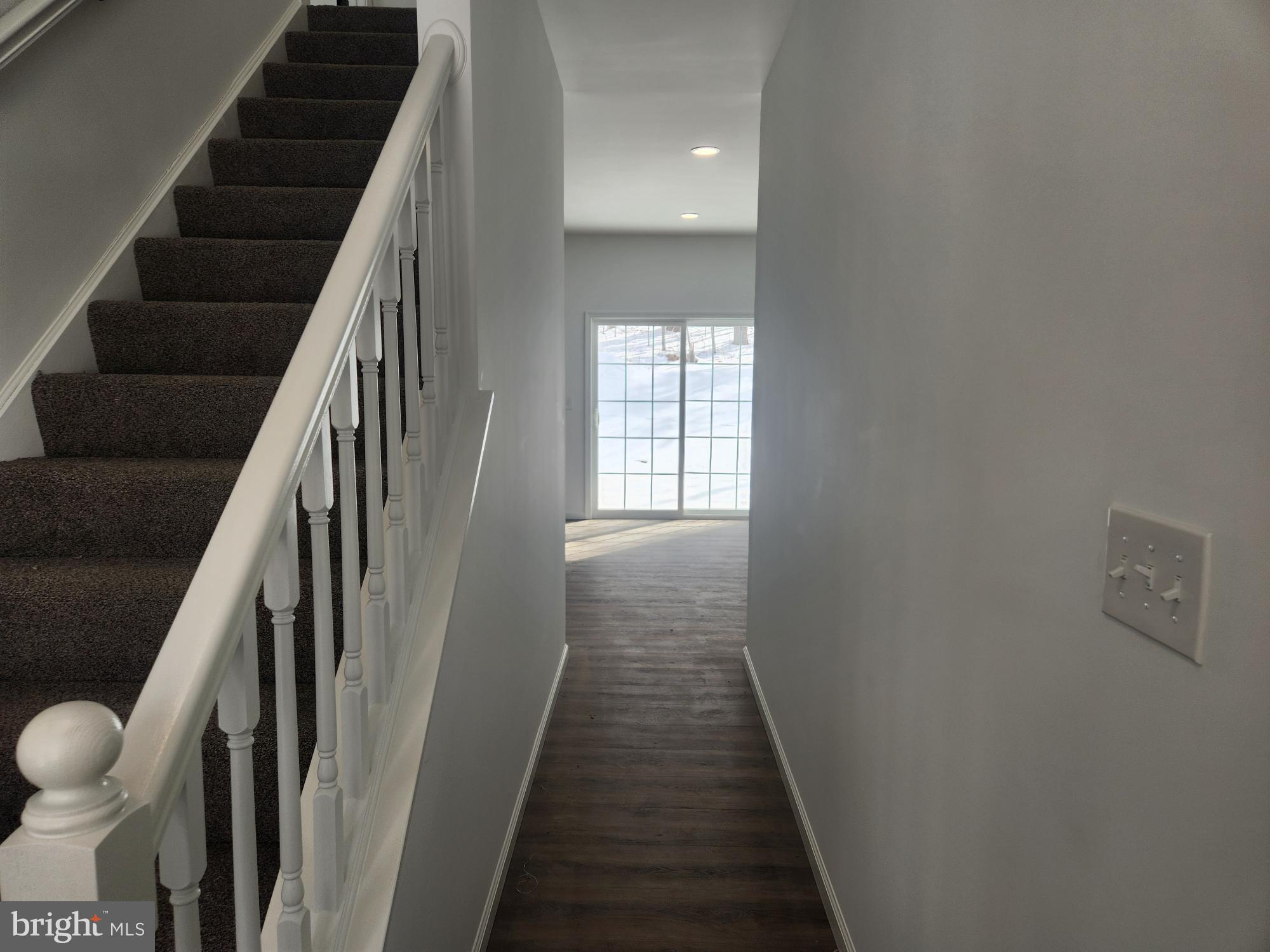 1929 Dunkleberger Road Elliottsburg, PA 17024 - Photo 19 of 48 a view of a hallway with wooden floor and entryway