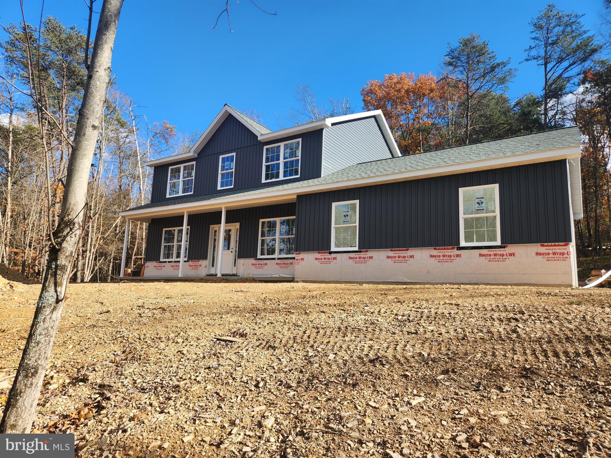 1929 Dunkleberger Road Elliottsburg, PA 17024 - Photo 2 of 23 a front view of a house with a yard