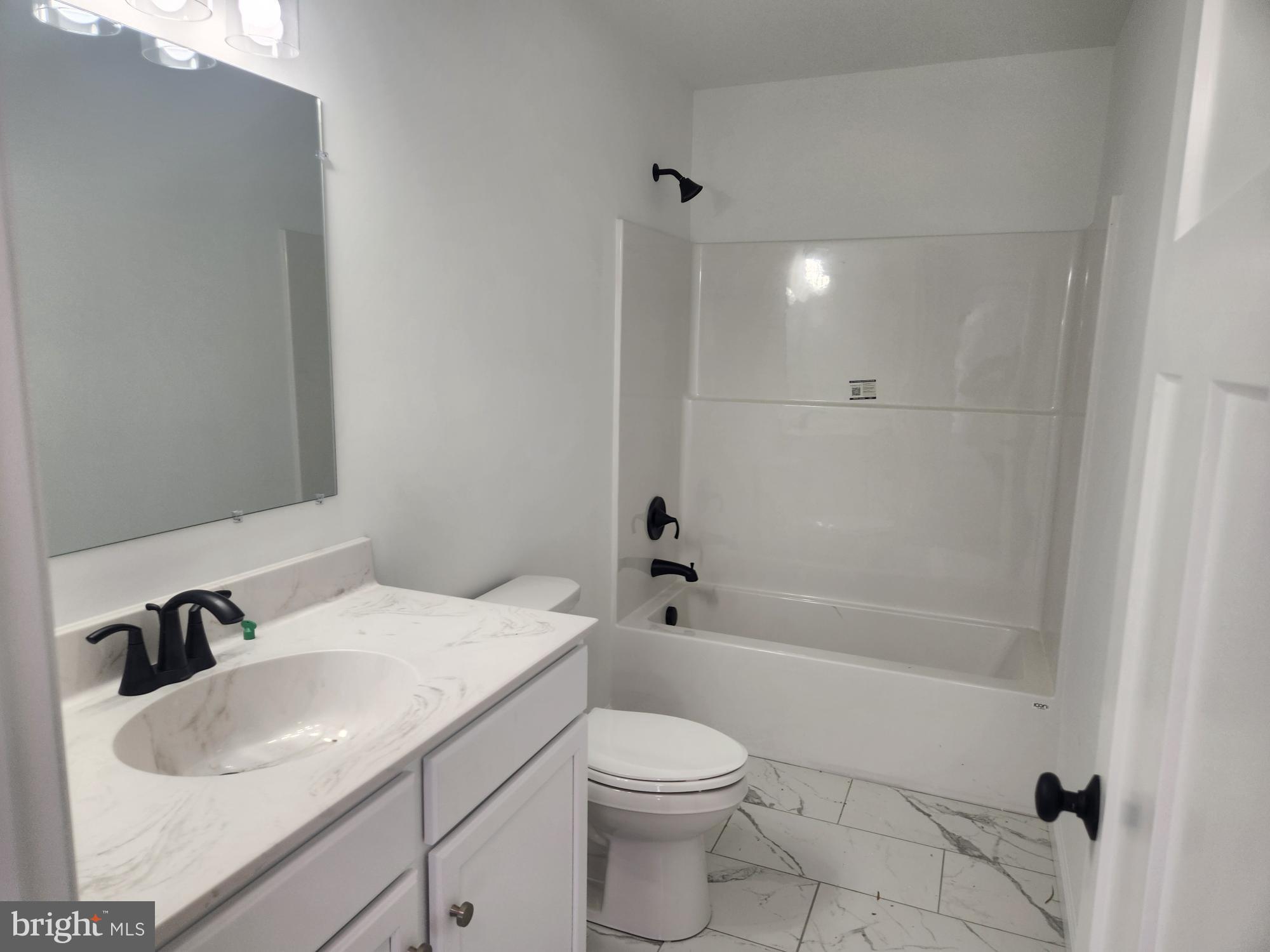 1929 Dunkleberger Road Elliottsburg, PA 17024 - Photo 31 of 48 a bathroom with a sink toilet and shower