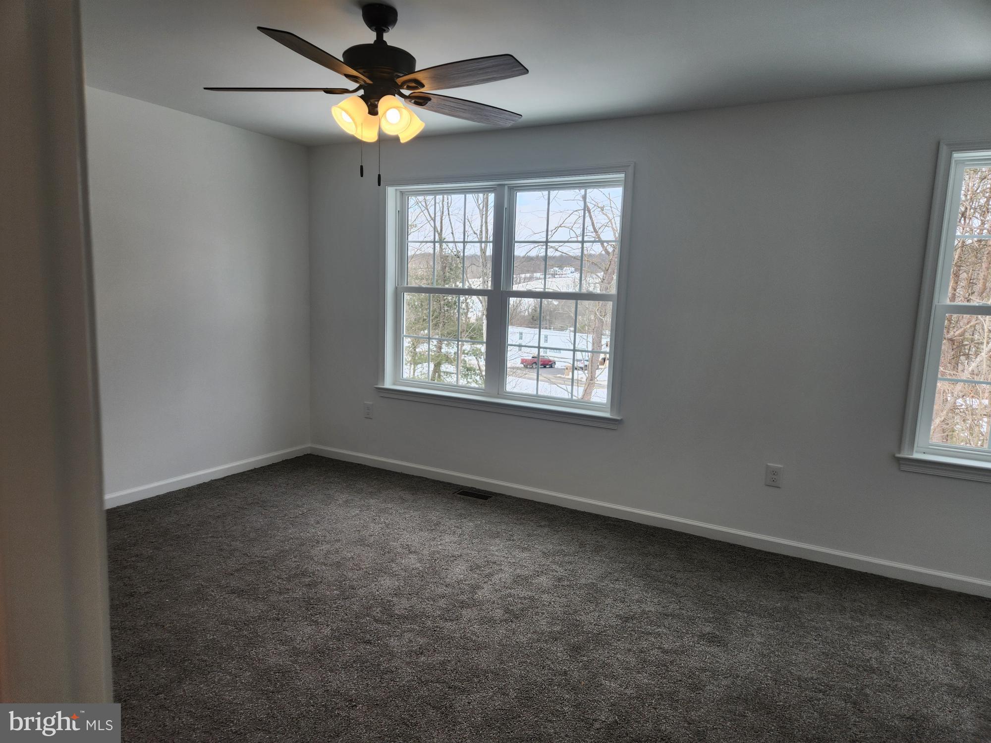 1929 Dunkleberger Road Elliottsburg, PA 17024 - Photo 34 of 48 an empty room with windows and fan