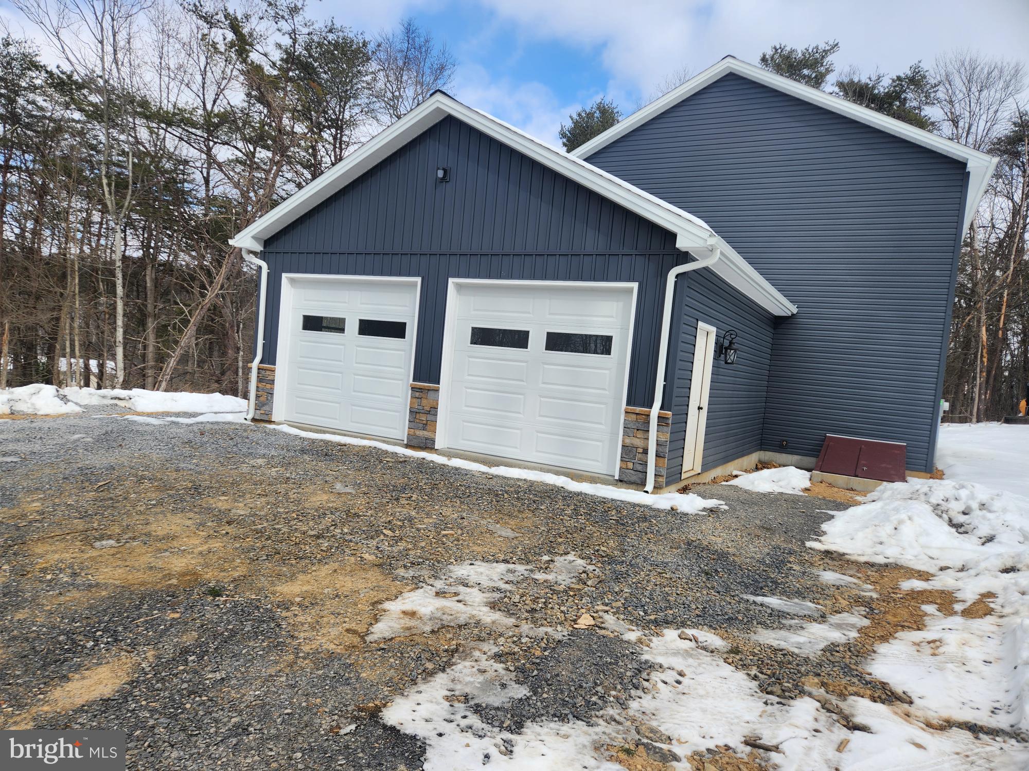 1929 Dunkleberger Road Elliottsburg, PA 17024 - Photo 45 of 48 a front view of a house with a yard
