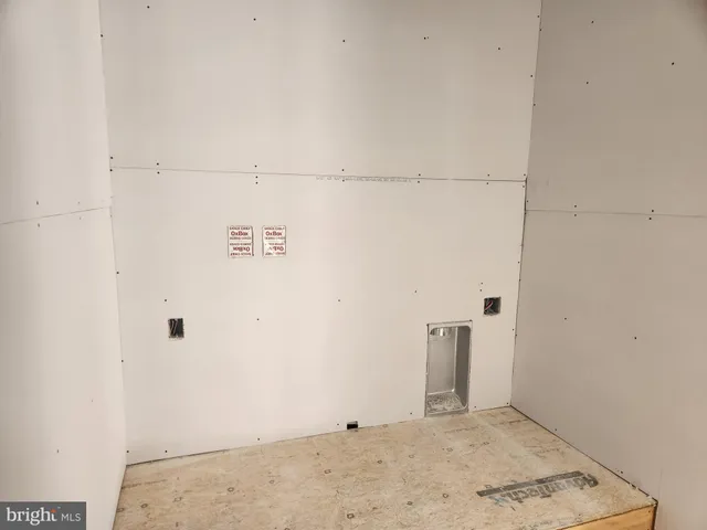 wooden floor and window in an empty room