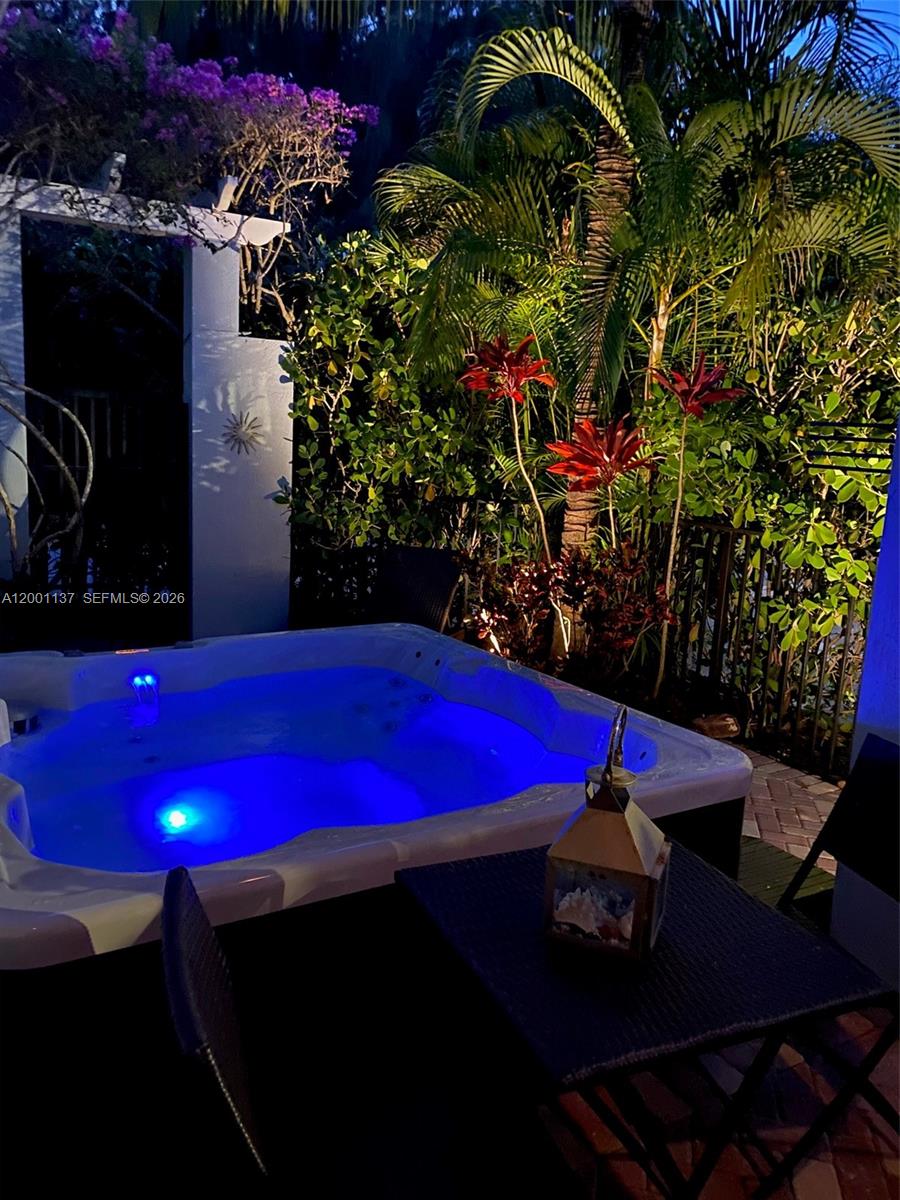 184 West Bay Cedar Circle Jupiter, FL 33458 - Photo 32 of 49 a view of outdoor space with seating area