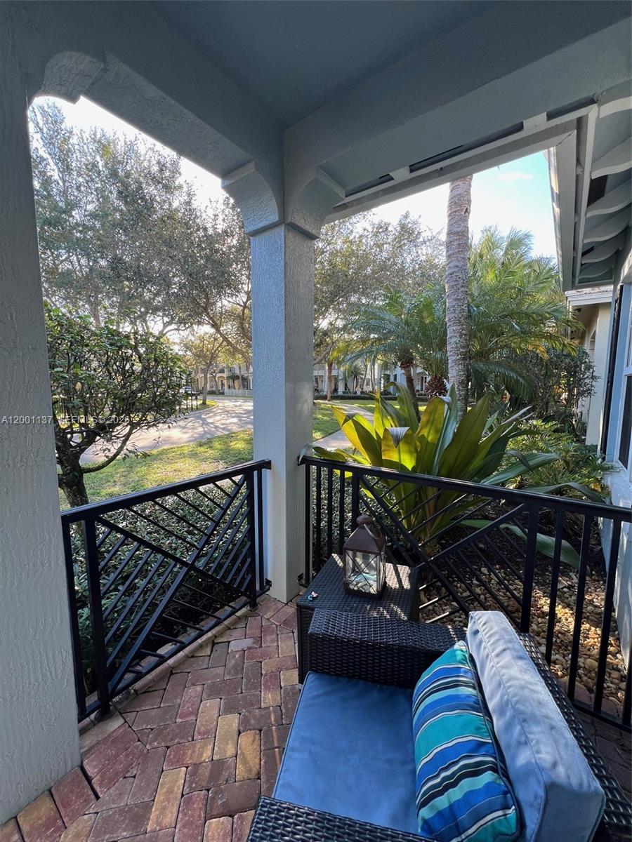 184 West Bay Cedar Circle Jupiter, FL 33458 - Photo 6 of 49 a view of outdoor space with seating area