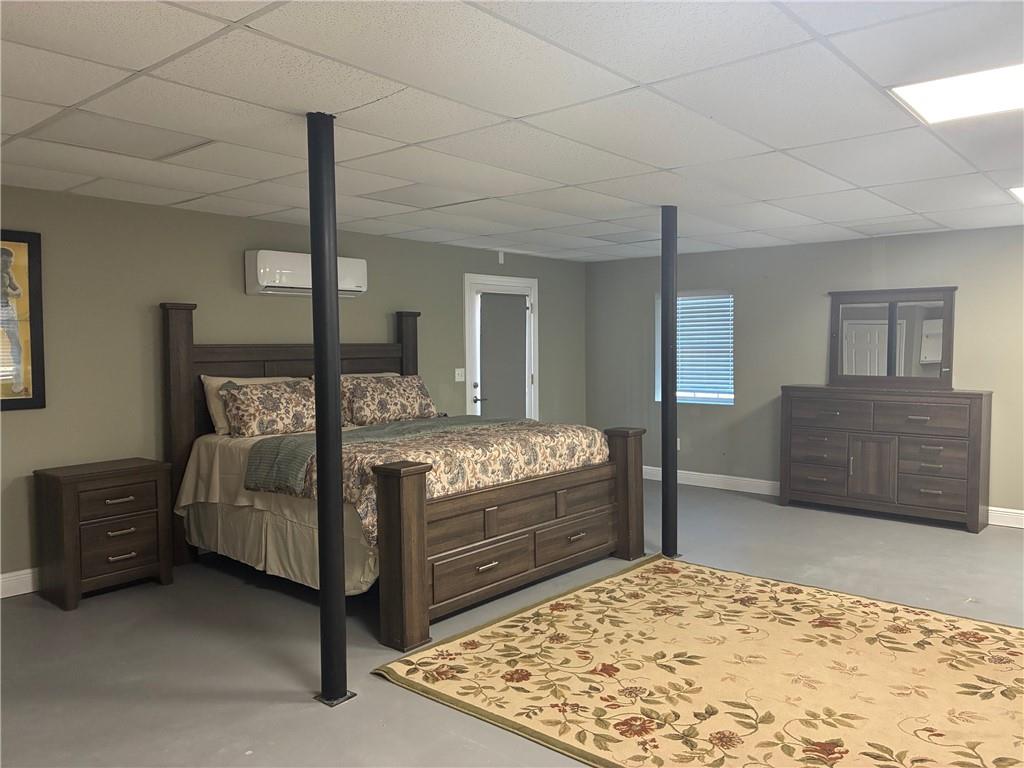 6158 Suwanee Dam Road Sugar Hill, GA 30518 - Photo 11 of 20 a bedroom with a bed and a dresser