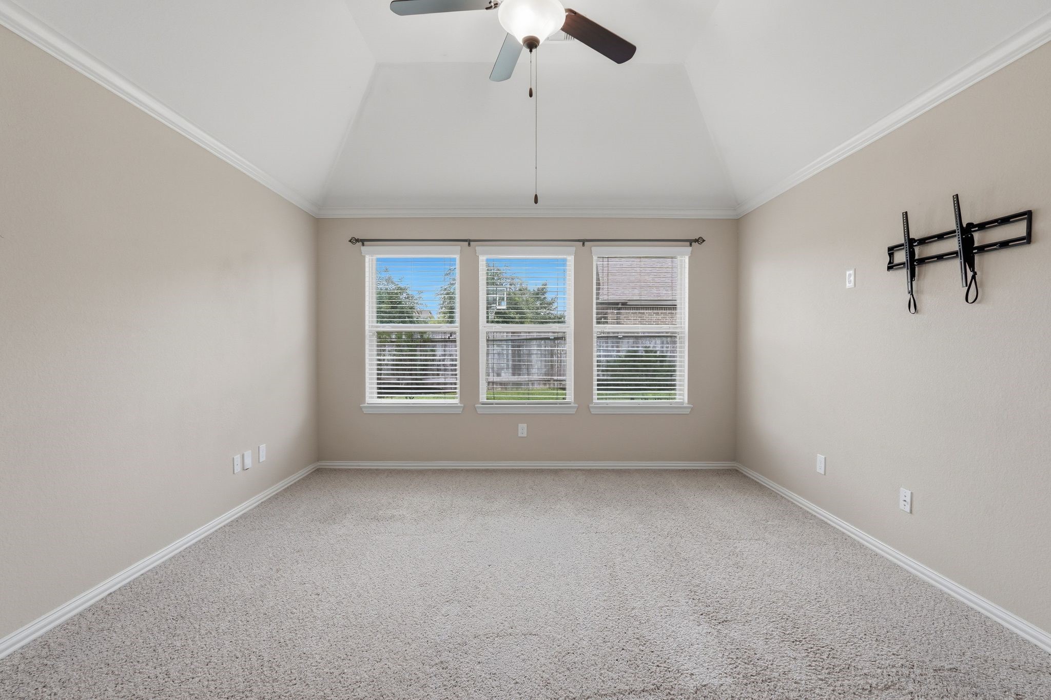 18227 Tacoma Ridge Drive Tomball, TX 77377 - Photo 22 of 45 Bright and airy primary bedroom with large windows and an inviting layout.