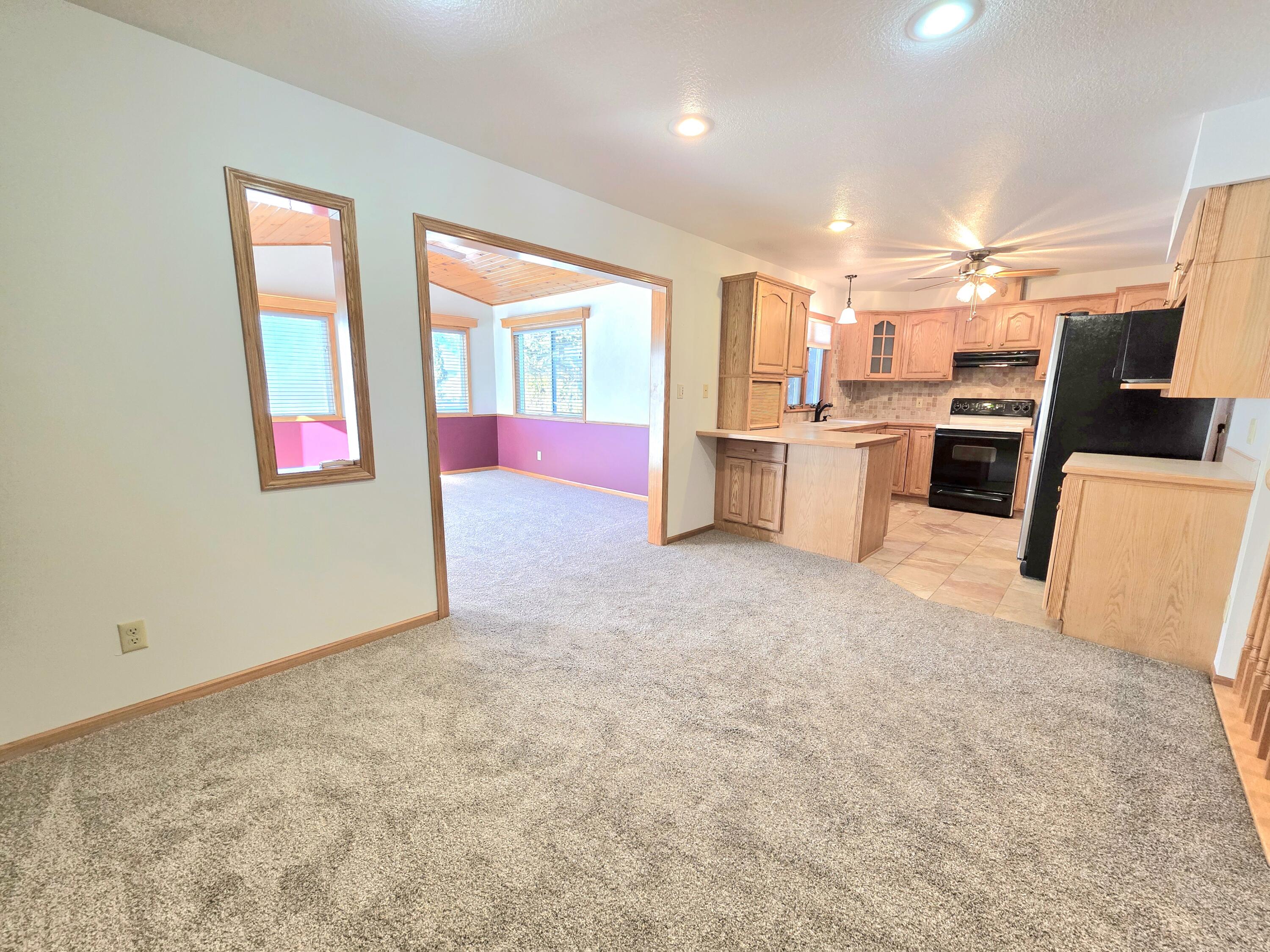 129 Chippewa Drive Sheboygan Falls, WI 53085 - Photo 8 of 43 Dining room and kitchen