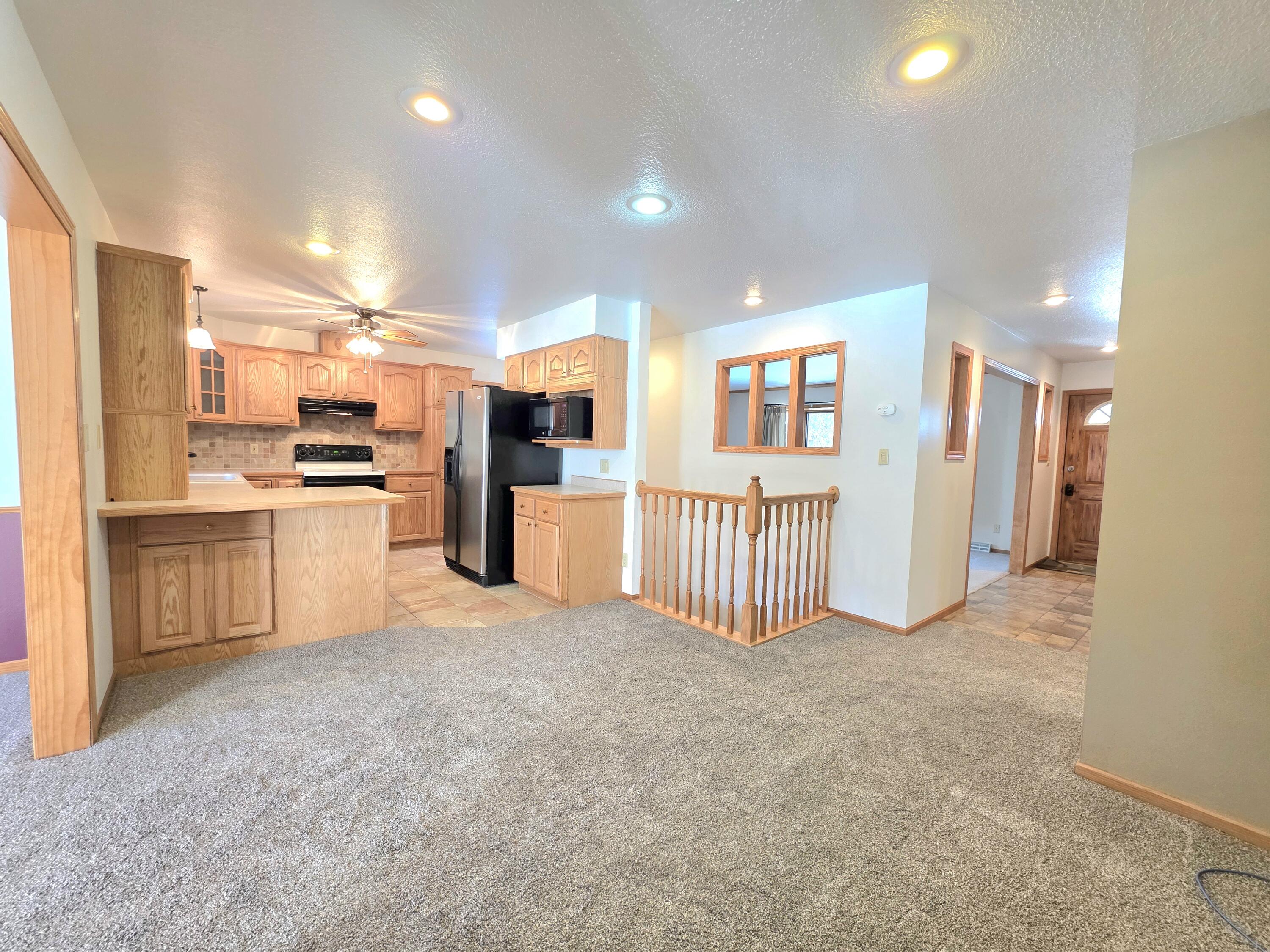 129 Chippewa Drive Sheboygan Falls, WI 53085 - Photo 9 of 43 Dining room and kitchen