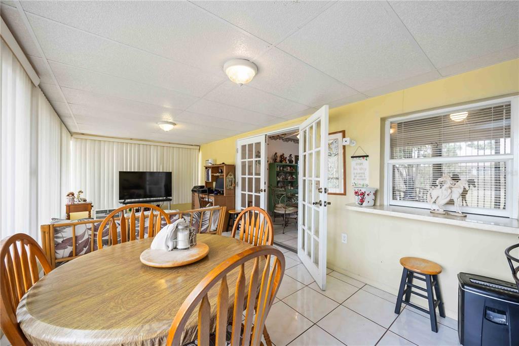 3801 Chinaberry Road Bradenton, FL 34208 - Photo 18 of 31 a view of a dining room with furniture