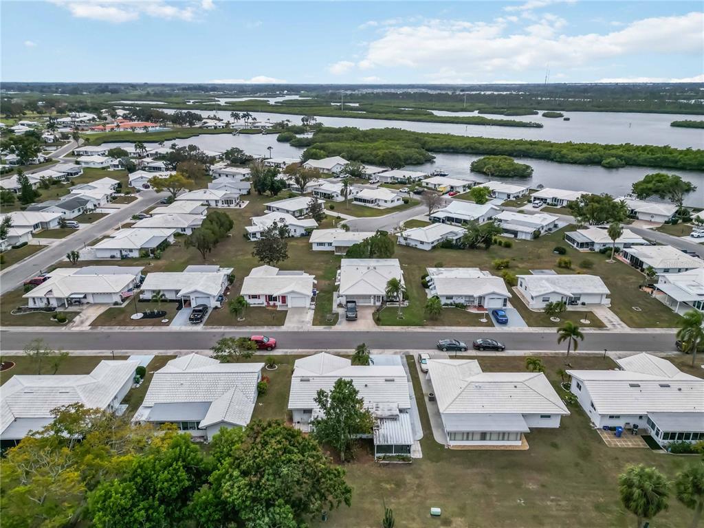 3801 Chinaberry Road Bradenton, FL 34208 - Photo 29 of 31 an aerial view of a building with outdoor space
