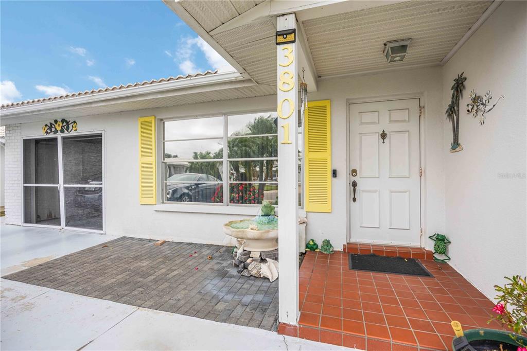 3801 Chinaberry Road Bradenton, FL 34208 - Photo 4 of 31 a front view of a house with basket ball court