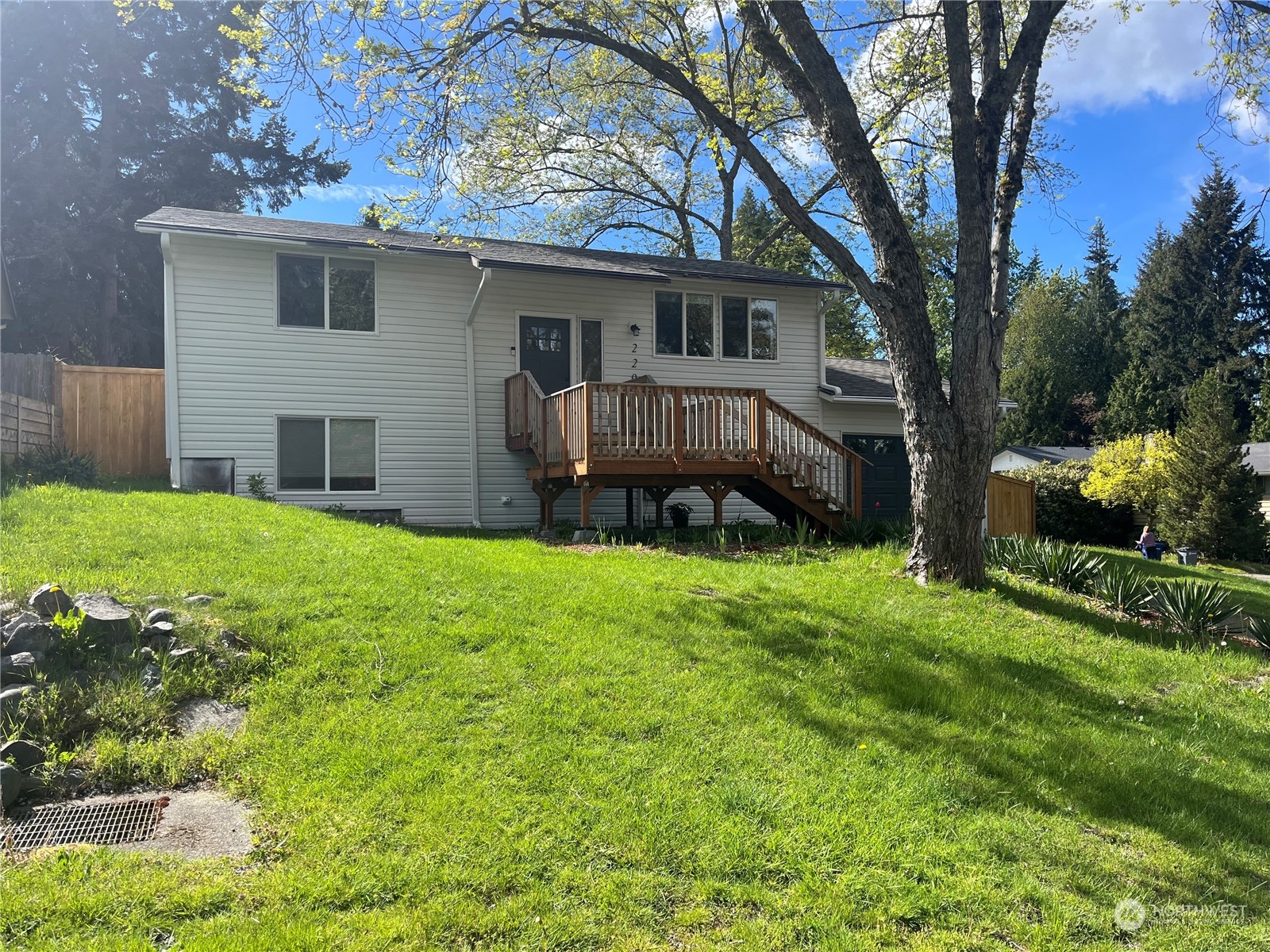 a house view with a garden space