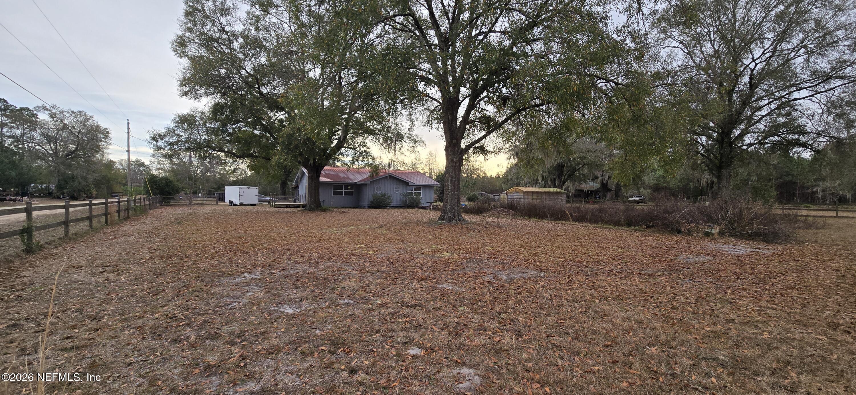 2720 Crystal Place Hilliard, FL 32046 - Photo 22 of 35 a view of outdoor space with tree s