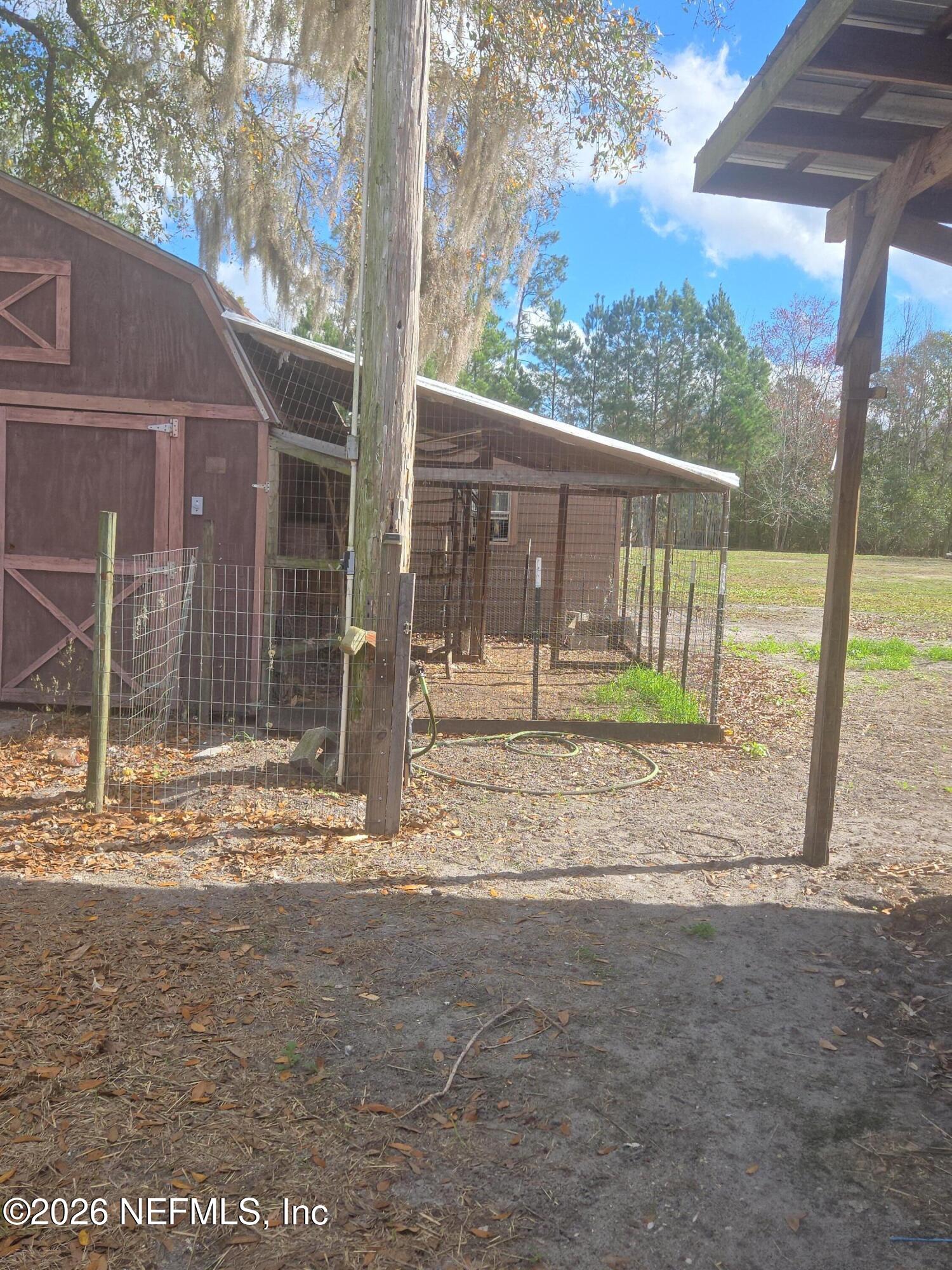 2720 Crystal Place Hilliard, FL 32046 - Photo 34 of 35 a view of backyard with green space