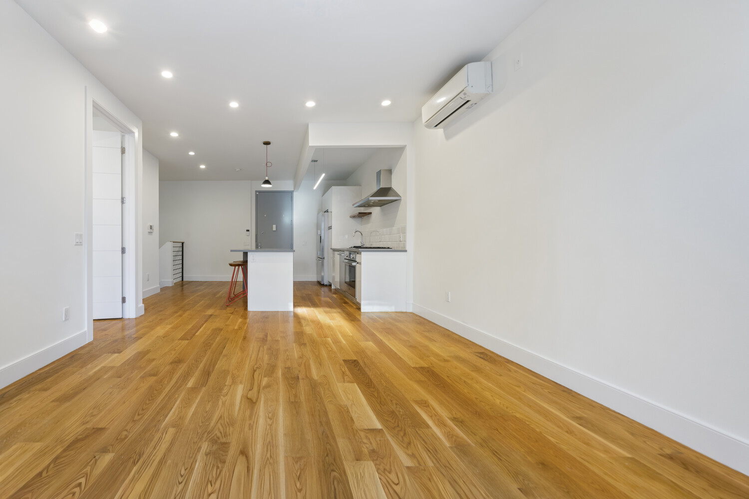 79 Clay Street, Unit 1R Brooklyn, NY 11222 - Photo 8 of 11 a view of empty room with wooden floor